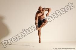 Underwear Gymnastic poses Man Black Muscular Bald Dancing Dynamic poses Academic